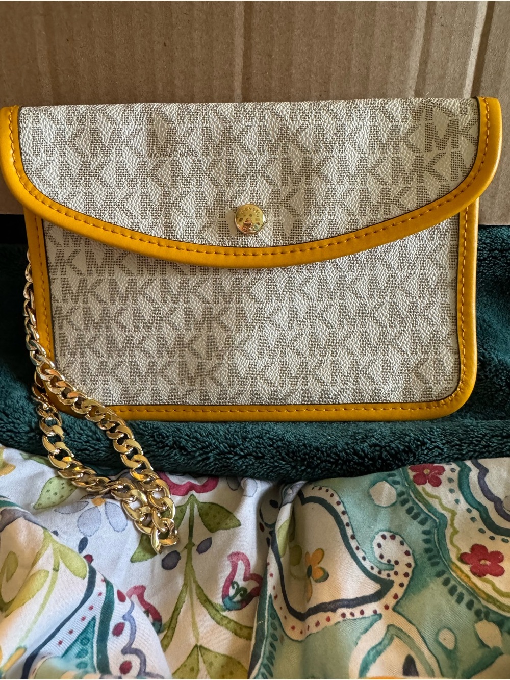 Michael Kors Beige Logo Wristlet with Yellow Trim and Gold Chain